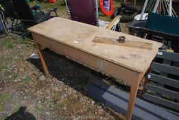 A stripped pine narrow bench/table.