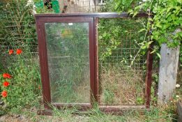 A timber framed window partly glazed 44" x 48".