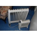 A Holmes oil filled radiator and Supawarm radiator.