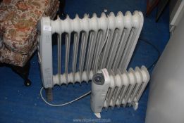 A Holmes oil filled radiator and Supawarm radiator.