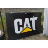 A large plastic 'CAT' sign, 40" x 63".