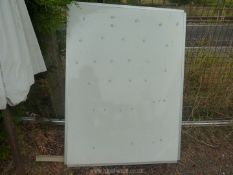 A large dry wipe board.