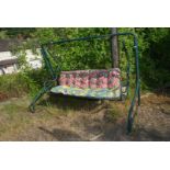 A swing seat with cushions 10' x 5' high.