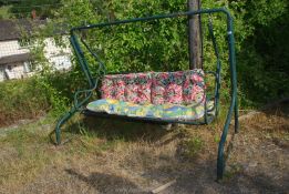 A swing seat with cushions 10' x 5' high.
