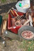 A quantity of terracotta pots, tools, wooden dowels, etc.