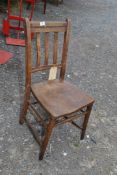 An elm seated Chair for restoration.