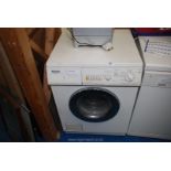 A Miele W833 Novotronic washing machine (latch damaged).