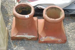 A pair of terracotta chimney pots 14" high x 12 1/2" square.