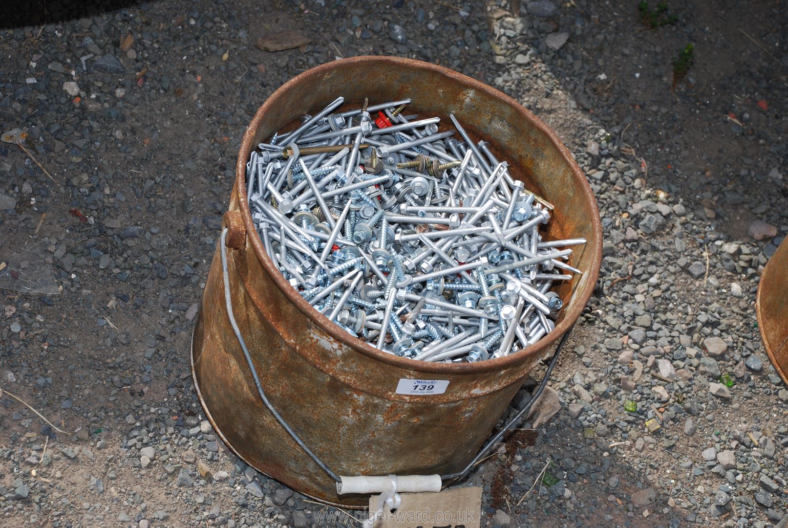 A bucket of tec screws; 2 1/2" and 1 1/2".