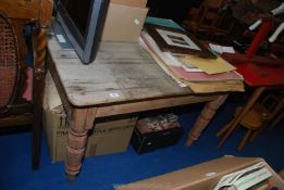 A wooden scrub top table 47 1/2" long x 37" deep x 29" high.