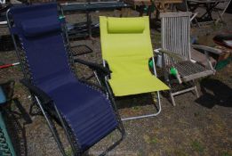 Three fold up garden chairs; two canvas and one wooden.