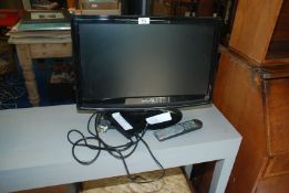 An Akura TV with remote (wrong power cable).
