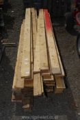 A quantity of softwood lengths; 114" down to 93" long.