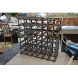 A wood and metal wine rack.