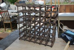 A wood and metal wine rack.