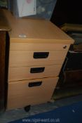 A 3 drawer cabinet, no key, 16" wide x 28" high x 24" deep.