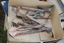 A quantity of period wrought iron gutter brackets.