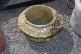 A circular chimney top 14" diameter x 7" high.