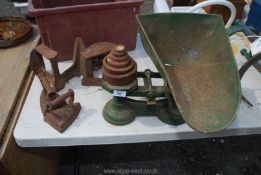 Cast iron shop scales, weights, flat irons, shoe lasts.