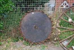 A swatch turning wheel with tines, 45'' diameter.