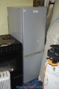 A silver fridge freezer 56" high x 20" wide x 22" deep.