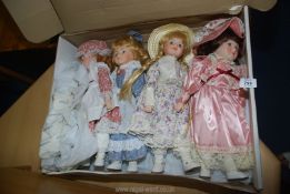 Porcelain dolls, two being Classic dolls.