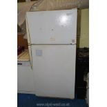 An industrial style fridge 30" wide x 30" deep x 65" high.