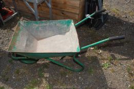 A solid tyre wheel barrow.