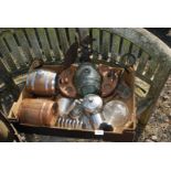 A box of small kegs and plated Teaset.