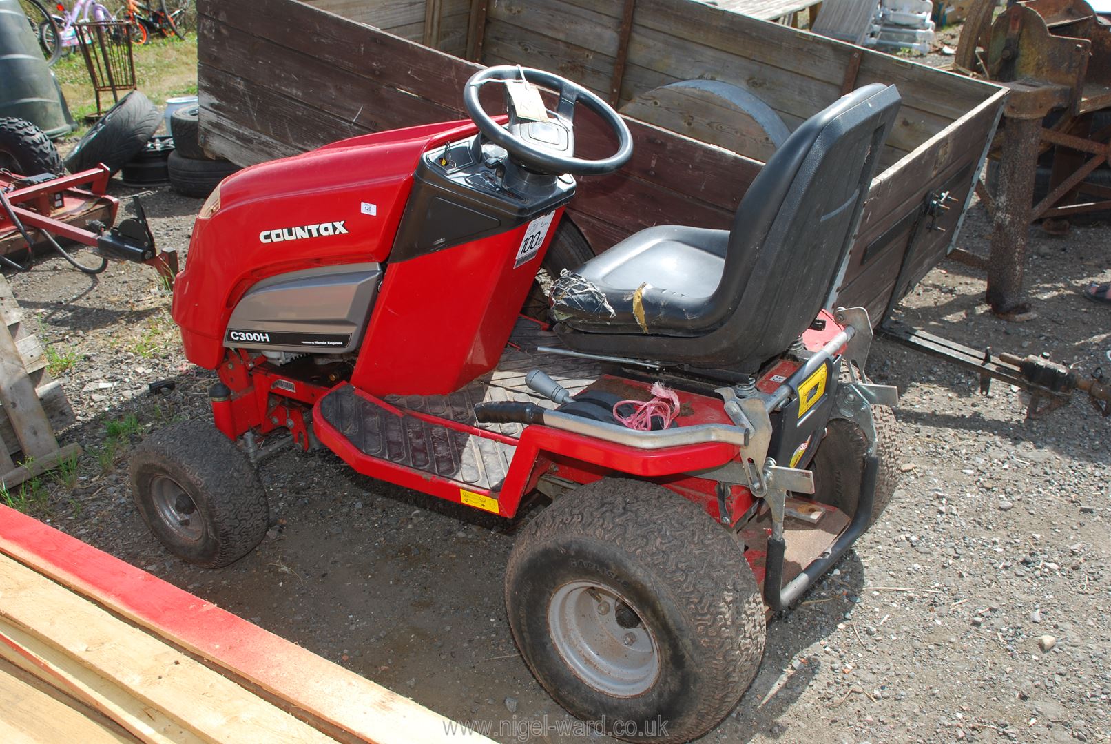 A 'Countax' ride-on tractor/mower (model no: C300H) with electric-start Honda V-twin engine,