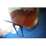 A drop leaf table 32" wide x 41" long (fully open).