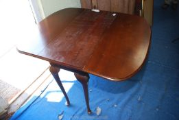 A drop leaf table 32" wide x 41" long (fully open).