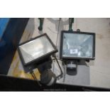 Two flood lights with sensors.