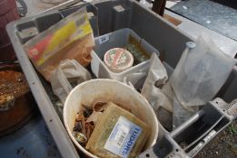 A large box of various nails, staples, etc.