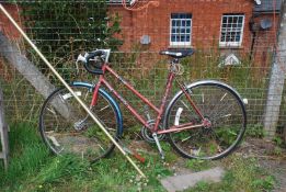 A 'Black Diamond Falcon' 10 speed bike with drop down handlebars.