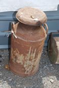 A large milk churn.