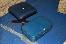 A case and a footstool.