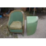 A Lloyd Loom linen basket and nursing chair, in green.