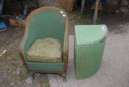 A Lloyd Loom linen basket and nursing chair, in green.
