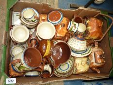 A quantity of Devon and cottage ware including tyg, jug, cups, plates etc.
