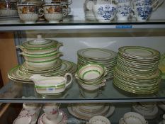 A good quantity of Bridgewood dinnerware in green and cream pattern to include plates, bowls,