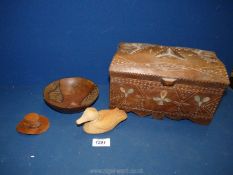 A small quantity of treen including carved lidded box with Mother of pearl inlay, bowl, duck etc.