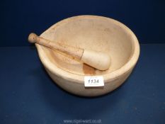 A large cream pestle (handle a/f) and mortar, 10'' diameter.