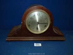 A Napoleon hat shaped mantle Clock, no key or pendulum present.