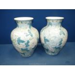 A pair of oriental style vases,