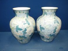 A pair of oriental style vases,