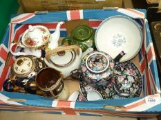 A quantity of teapots including Royal Albert Country Roses, Imari style teapot, stand and jug,