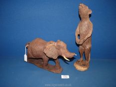 A hand carved elephant (lacking piece of ear and trunk), 12'' long x 7½'' high, 1.