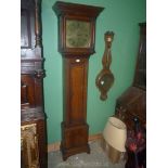 An Oak longcase Clock having a 30 hour movement with external count-wheel,