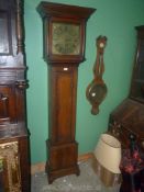 An Oak longcase Clock having a 30 hour movement with external count-wheel,